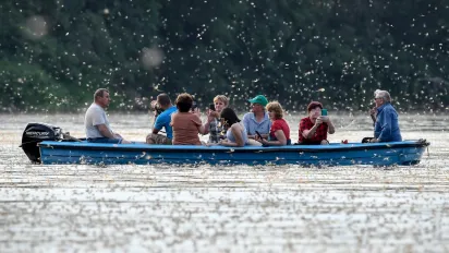 Tourists in a boat on the river